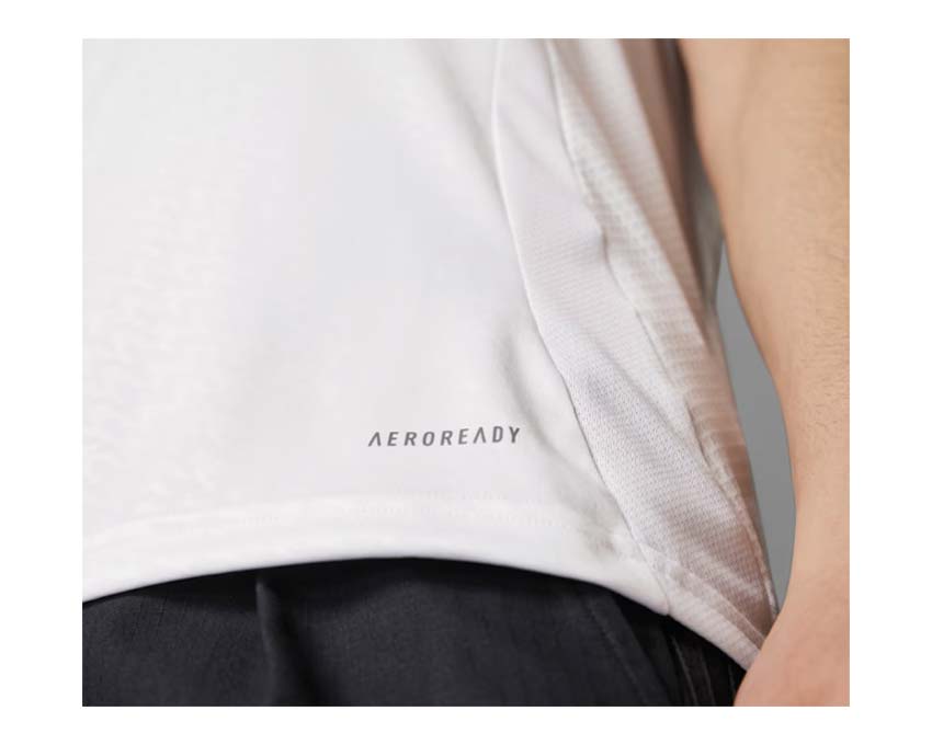 Adidas Camiseta Real Madrid 24/25 Local detalle — tejido HEAT.RDY y logo Adidas