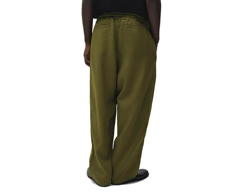 Arte Linen Pants Vert détail — finitions lin et poches latérales
