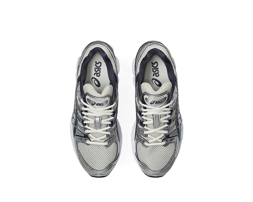Asics Gel-Nimbus 9 Oatmeal/Indigo Fog arrière — amorti Gel talon