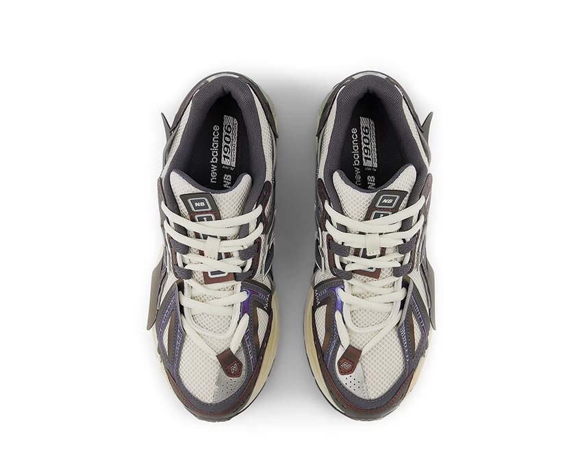 New Balance 1906A Classic Crimson/Sea Salt/Black Cement detalle — superposiciones de ante y nobuck