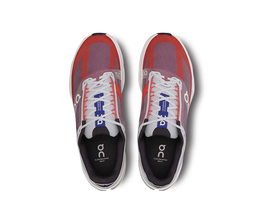 On Cloudsurfer Next Indigo/Flame Detail — belüftetes Mesh Herren-Laufschuh