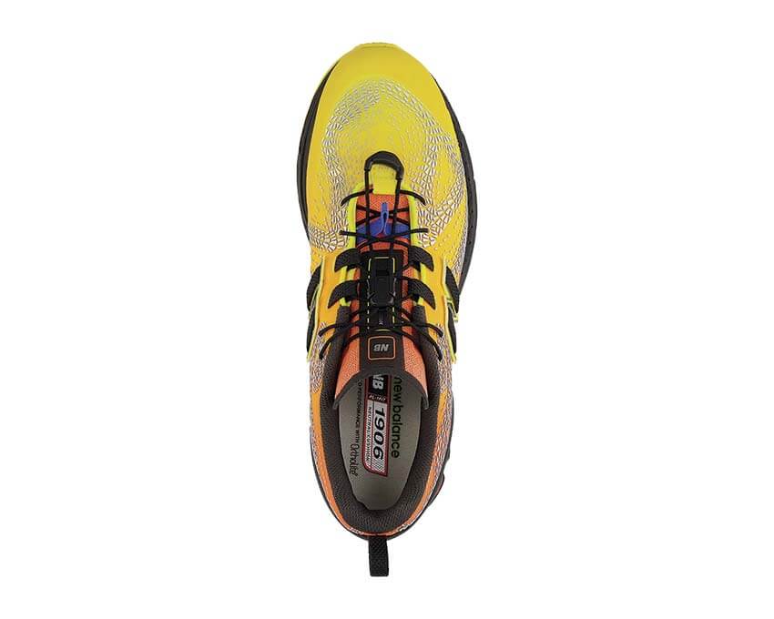 New Balance 1906F Jaune Punch détail — logo N et empiècements jaune punch