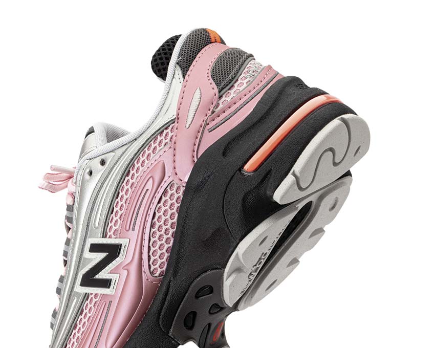 New Balance 1000 Pink Taffy vista laterale — silhouette trail pelle rosa taffy