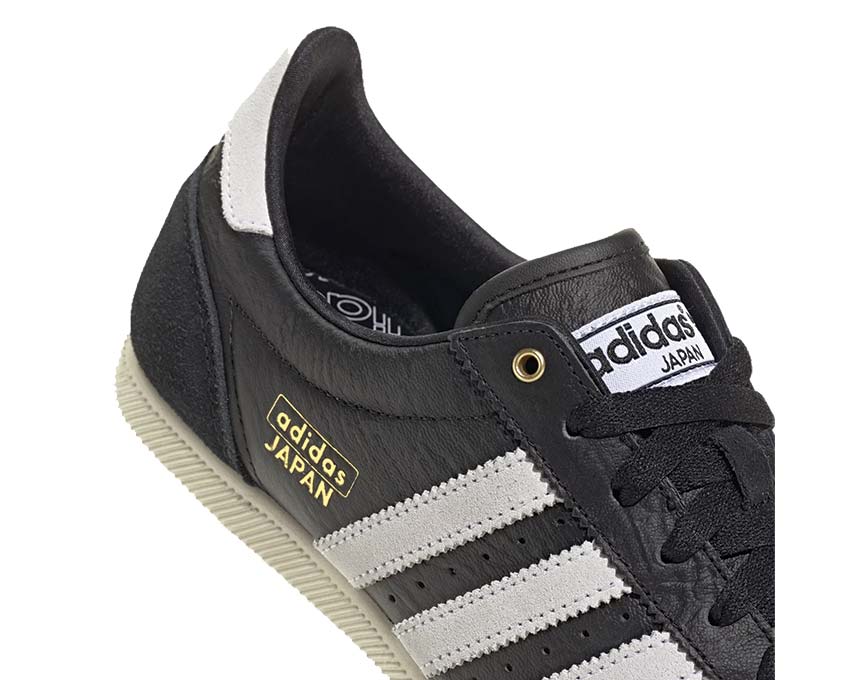 Adidas Japan W Core Black vue latérale — bandes dorées contrastées