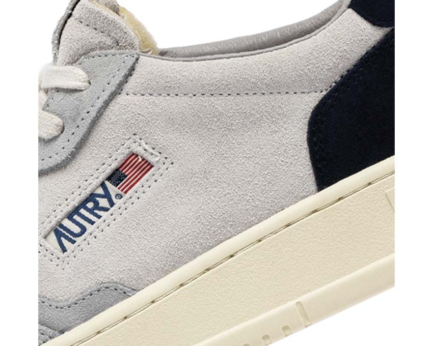Autry Medalist Low Tric Suede Loft Sky Blue side view — premium suede