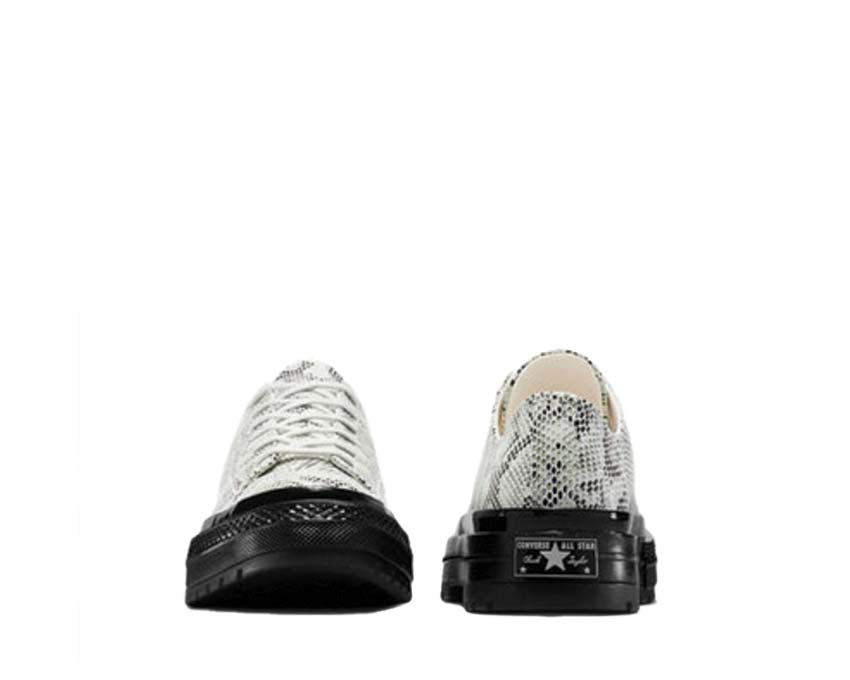 Converse Chuck 70 National OX Snakeskin vue latérale — profil low imprimé reptile