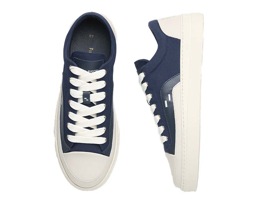 Filling Pieces Riviera Low Navy détail — logo Filling Pieces