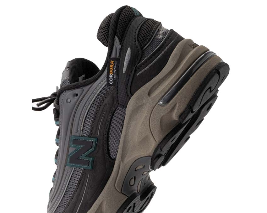 New Balance 1000 Cordura Black Cement side view — robust black Cordura upper