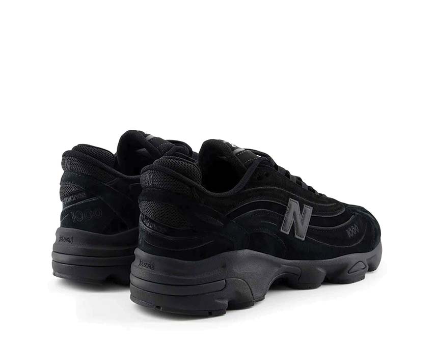 New Balance 1000 Black — vue avant coloris black monochrome