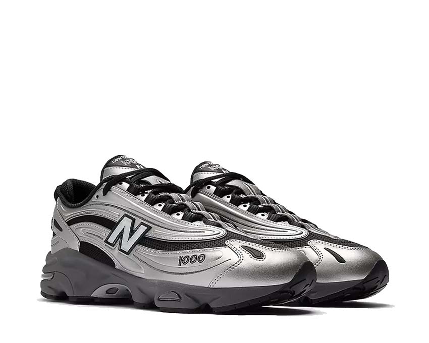 New Balance 1000 Metallic Silver vue latérale — reflets argentés sur tige premium