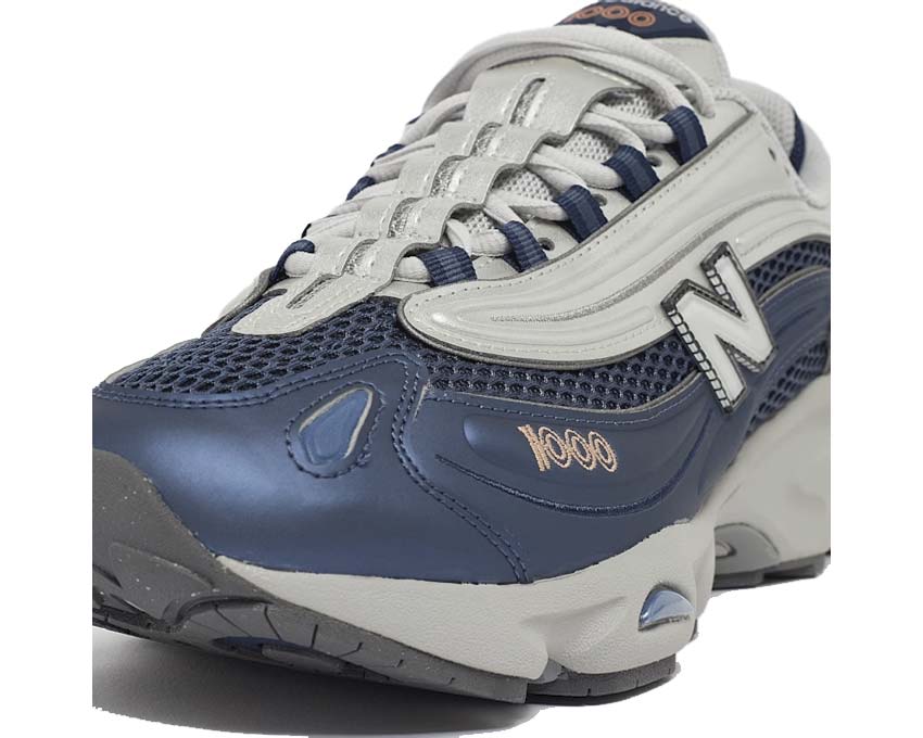 New Balance 1000 Vintage Indigo side view — leather and nubuck upper deep blue tone