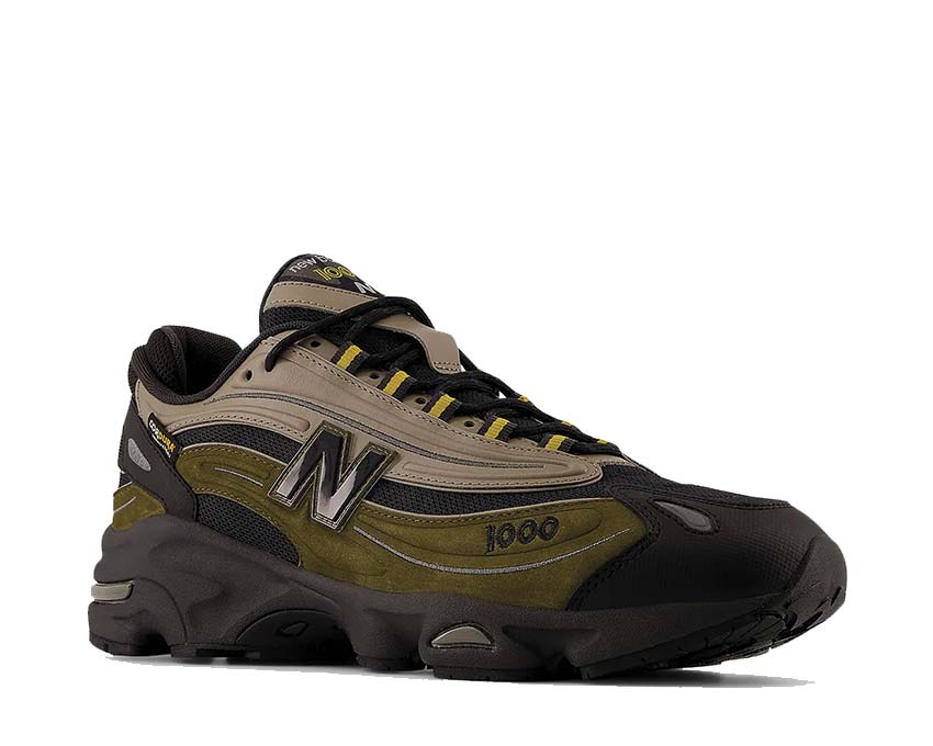 New Balance 1000 Woodland side view — multi-material upper in woodland tones