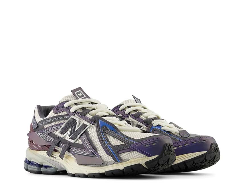 New Balance 1906A Inkwell lateral view — metallic mesh upper overlays