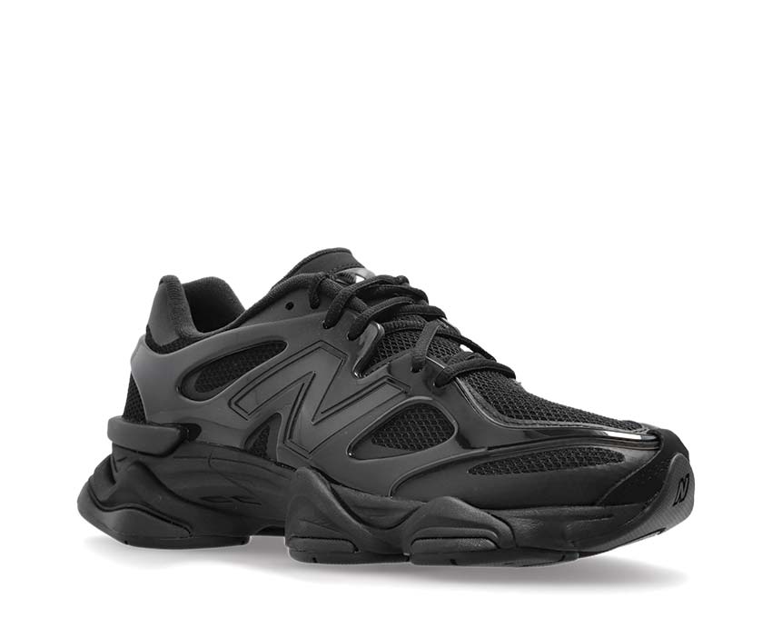 New Balance 9060 Black vista laterale — tomaia in pelle e mesh