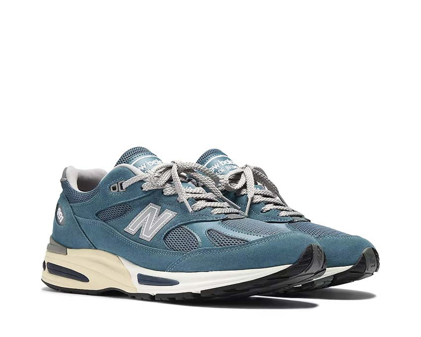 New Balance 991v2 Made in UK Tapestry vista lateral — mesh y ante tonos cálidos