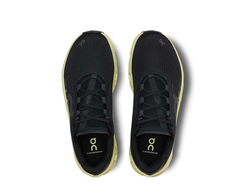 On Cloudmonster Black/Acacia detail — mesh upper men's running