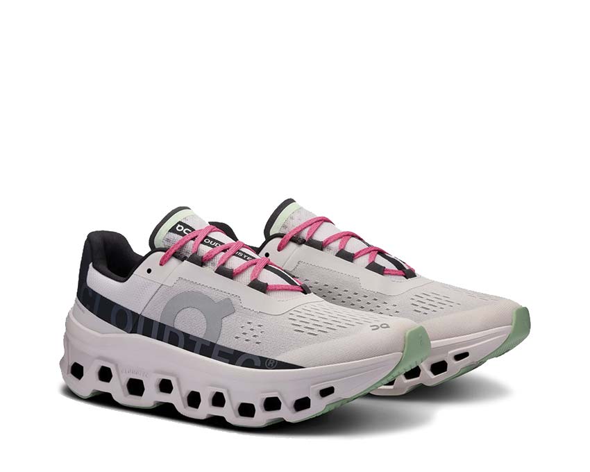 On Cloudmonster Frost/Black vue latérale — profil amorti CloudTec homme