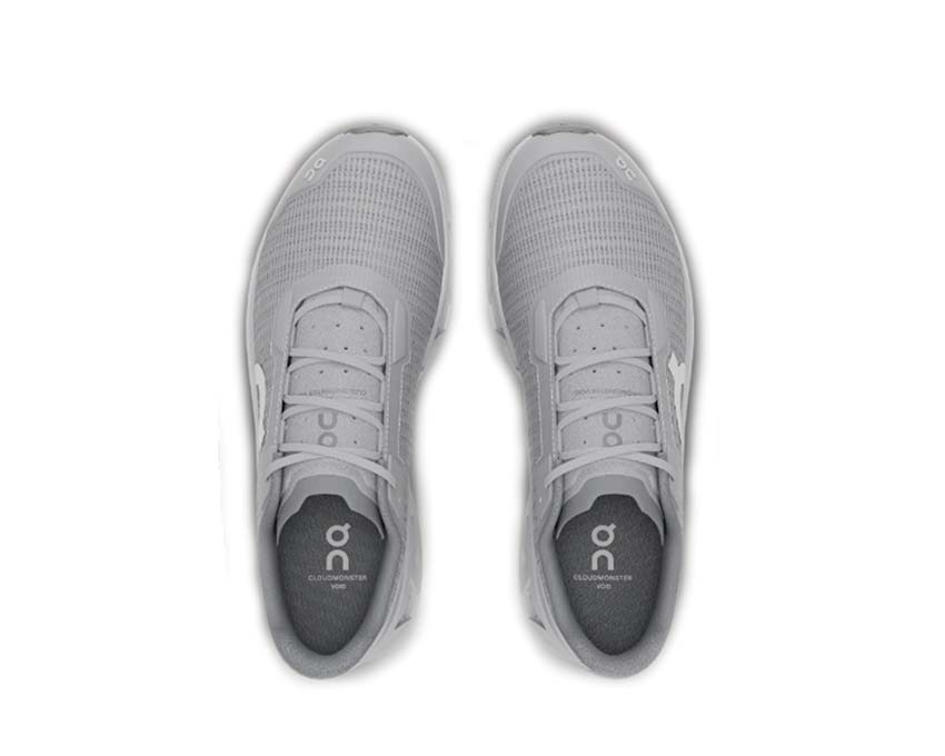 On Cloudmonster Void Alloy/Glacier détail — tige mesh running homme