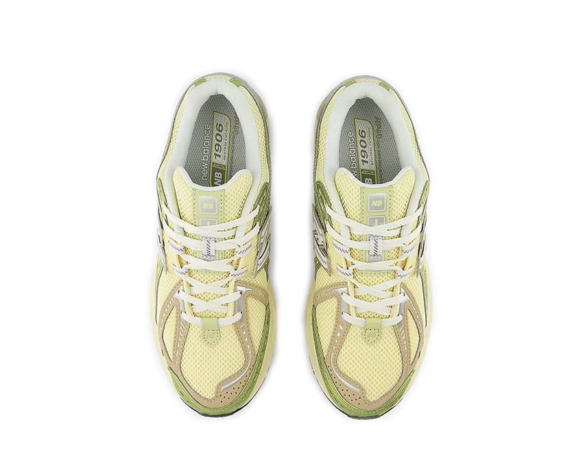 New Balance 1906R Yellow Parchment détail — broderie N lateral cuir