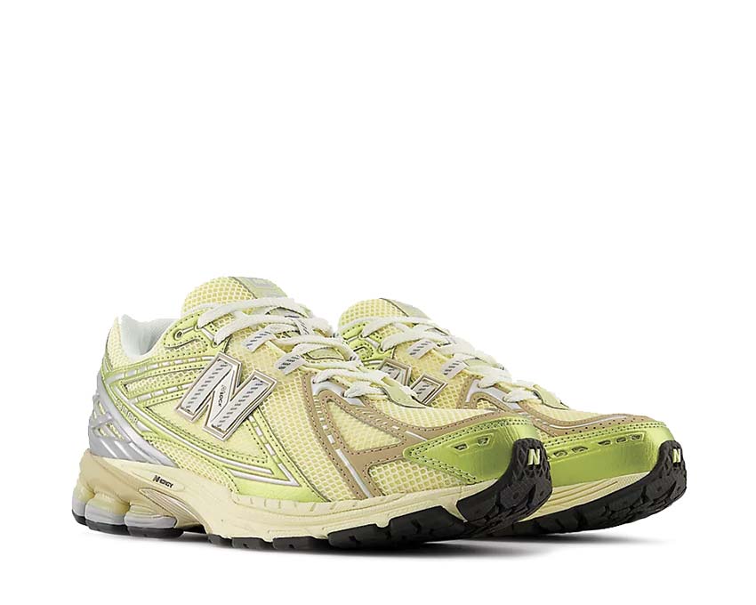 New Balance 1906R Yellow Parchment vue latérale — empiècements mesh premium