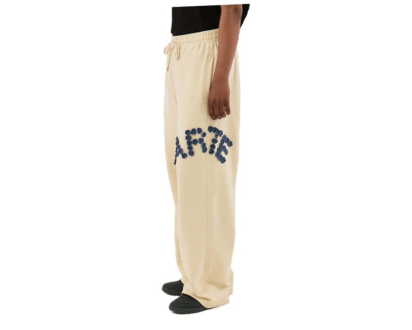 Arte Crochet Flowers Pants Cream vista laterale — texture uncinetto floreale