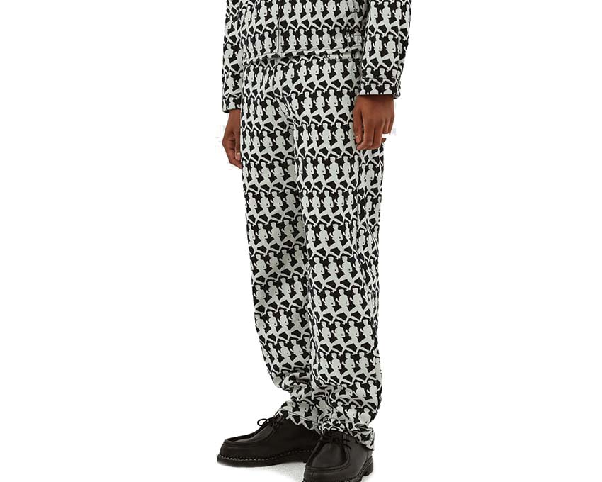 Arte Jones Allover Pants Navy side view — graphic printed fabric