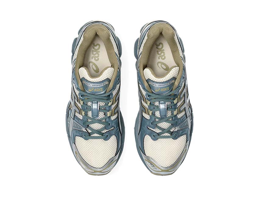 Asics Gel Nimbus 9 Oatmeal Iron Clay detalle — material premium