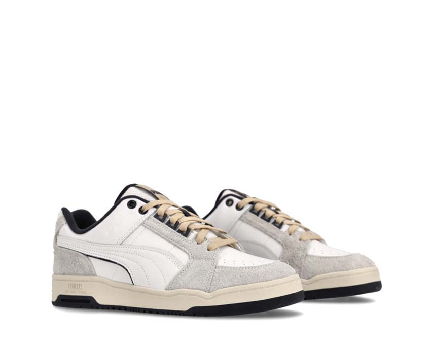 Puma Slipstream Lo Service Line White Navy vista lateral — cuero liso bicolor