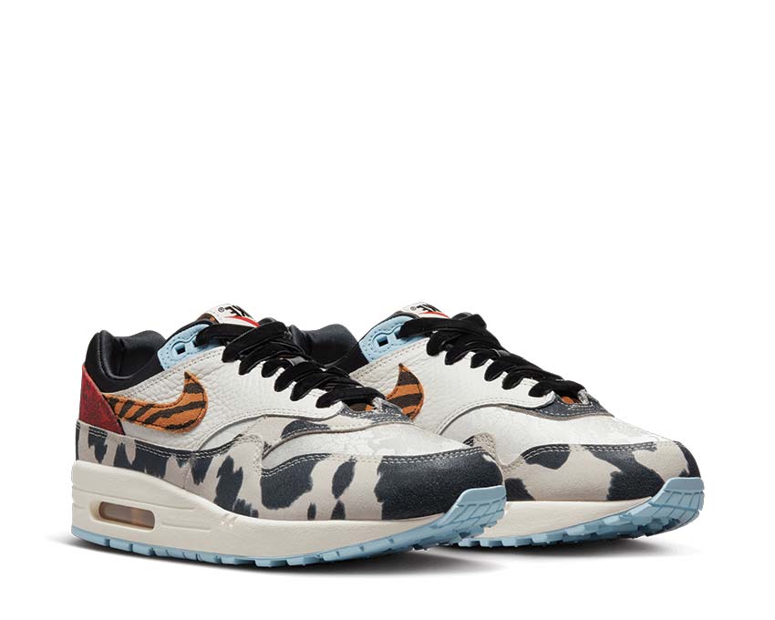 Nike Air Max 1 '87 Sail Black Celestine Blue side view — leather and suede